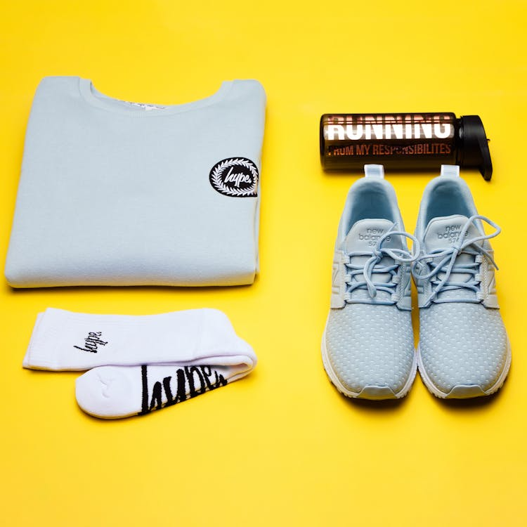 Full running kit under $300 — complete running gear laid out including shoes watch and apparel