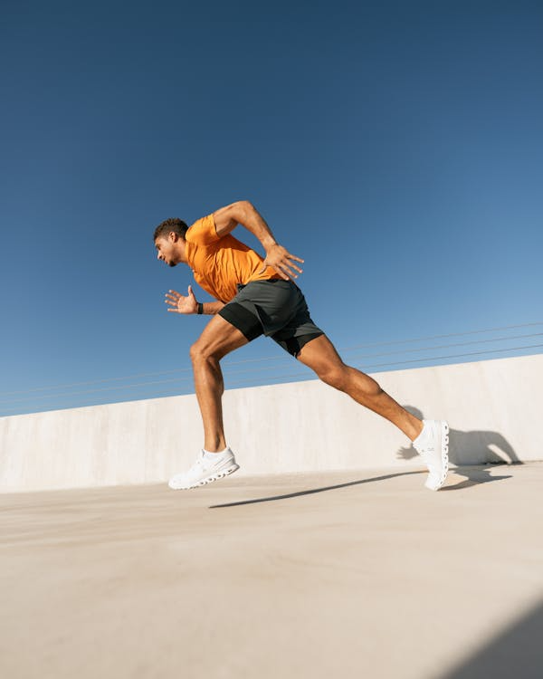 Running brand outlet vs full price comparison — brand outlet store running shoes display
