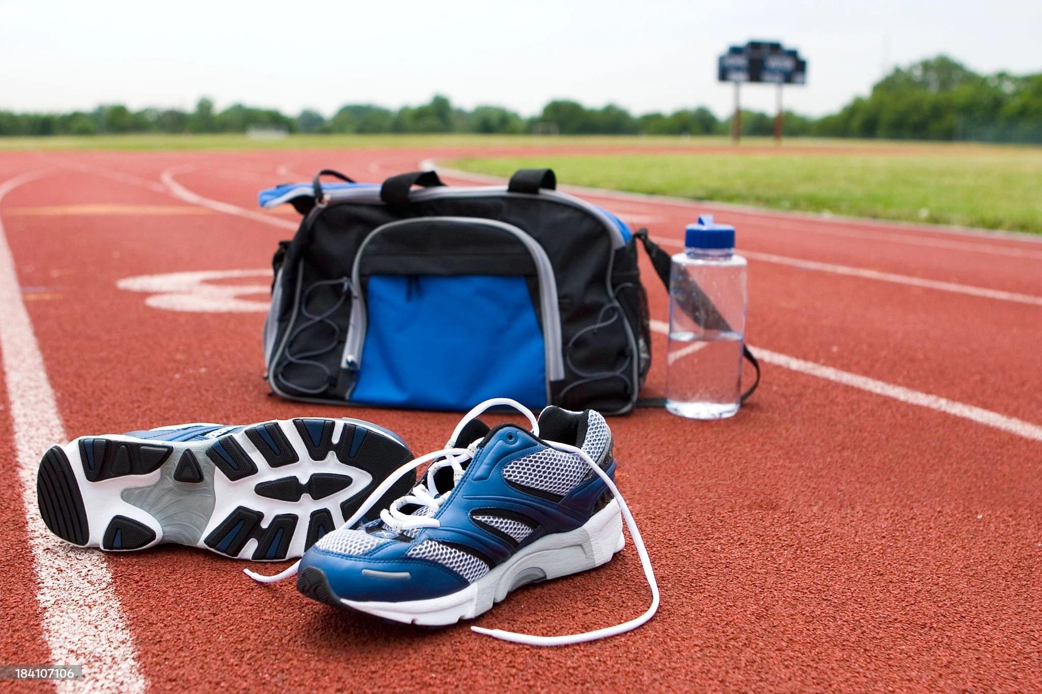Running gear price tracking tools — laptop showing price tracking dashboard for running gear