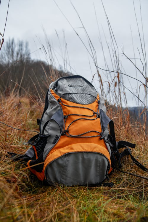 Osprey Atmos AG 65 review — backpack on trail with full load on hiker