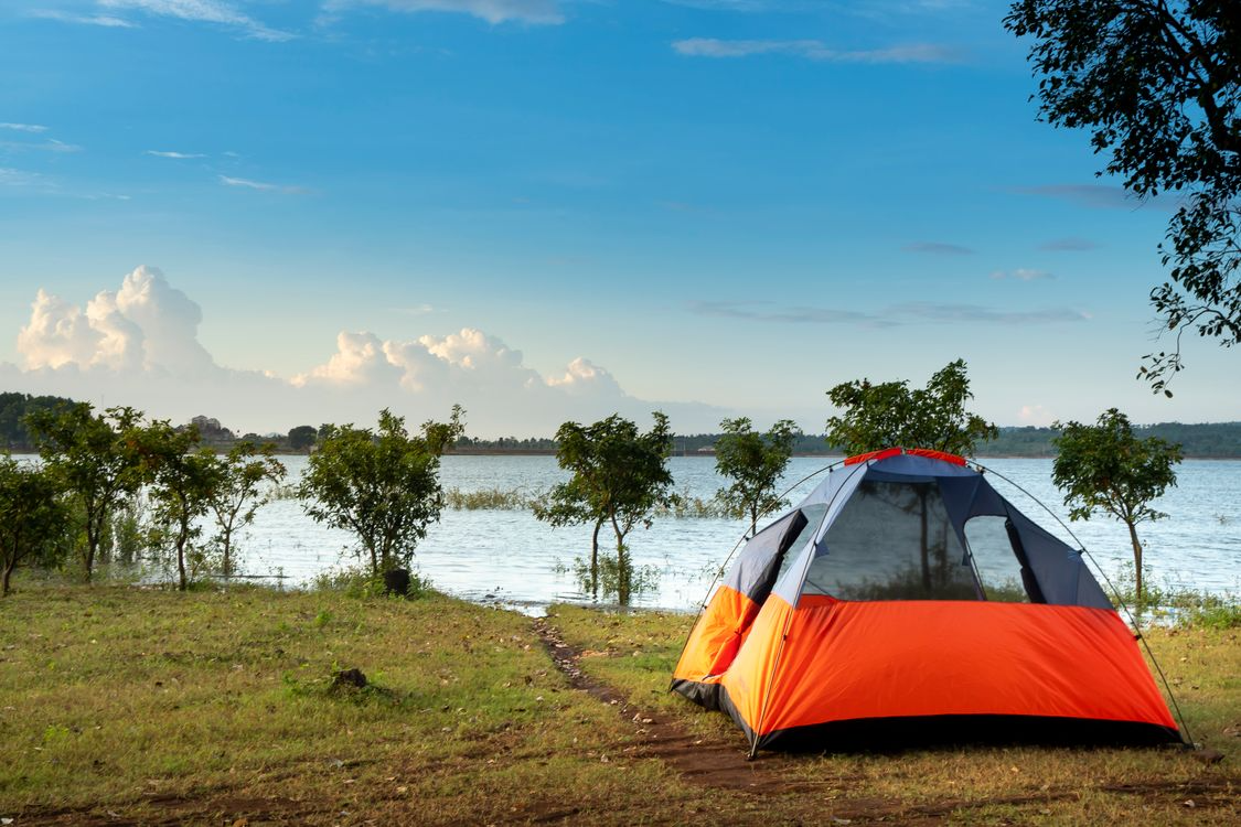 Best backpacking tent editors pick — tent pitched on mountain campsite at dusk