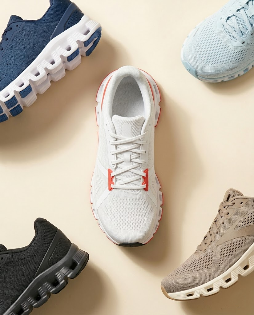 Best running shoes for flat feet 2026 — stability running shoe showing medial post on concrete